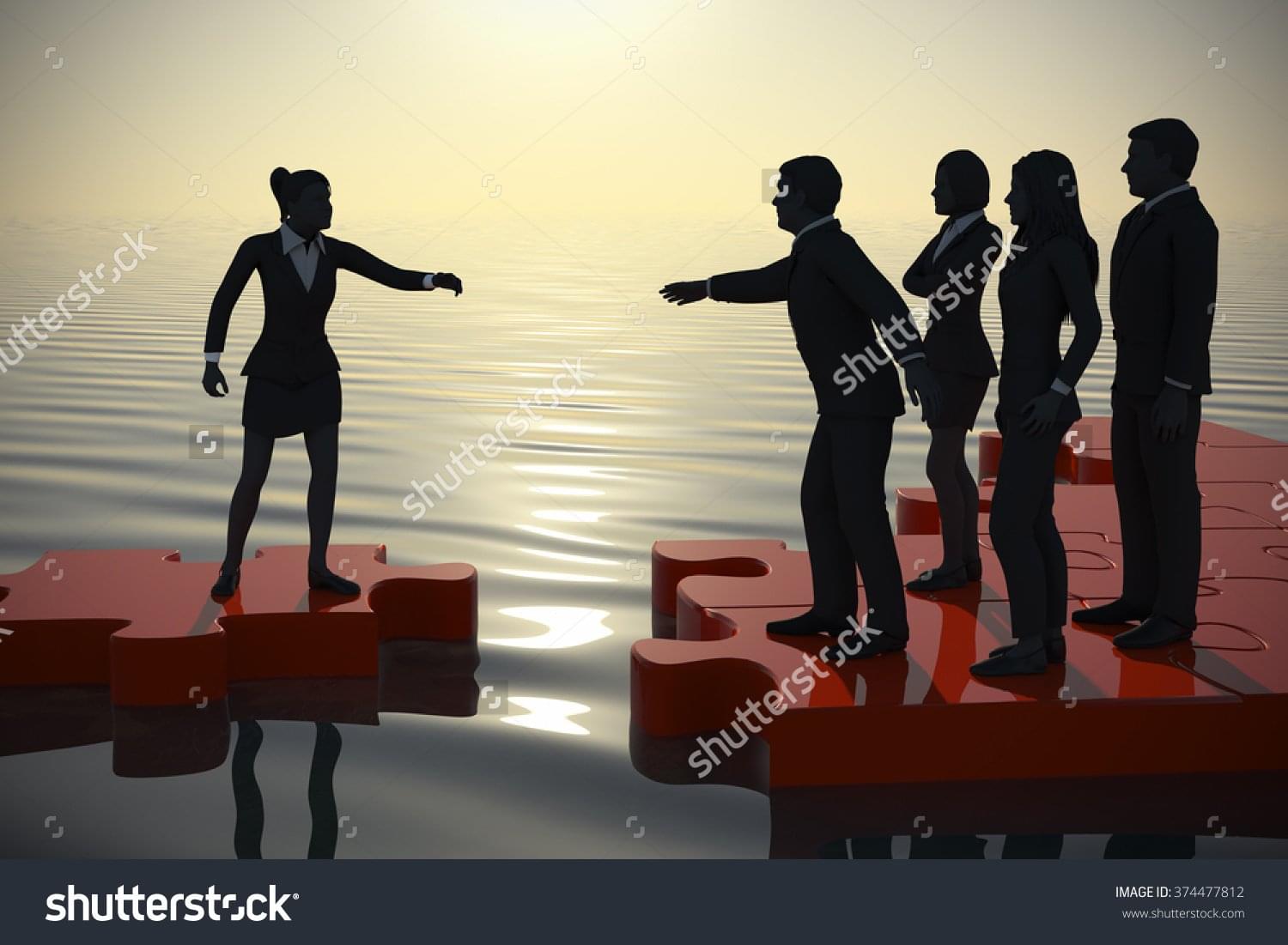 stock-photo-jigsaw-puzzle-recruiting-a-new-lady-executive-at-dawn-by-the-sea-a-successful-team-recruiting-a-374477812