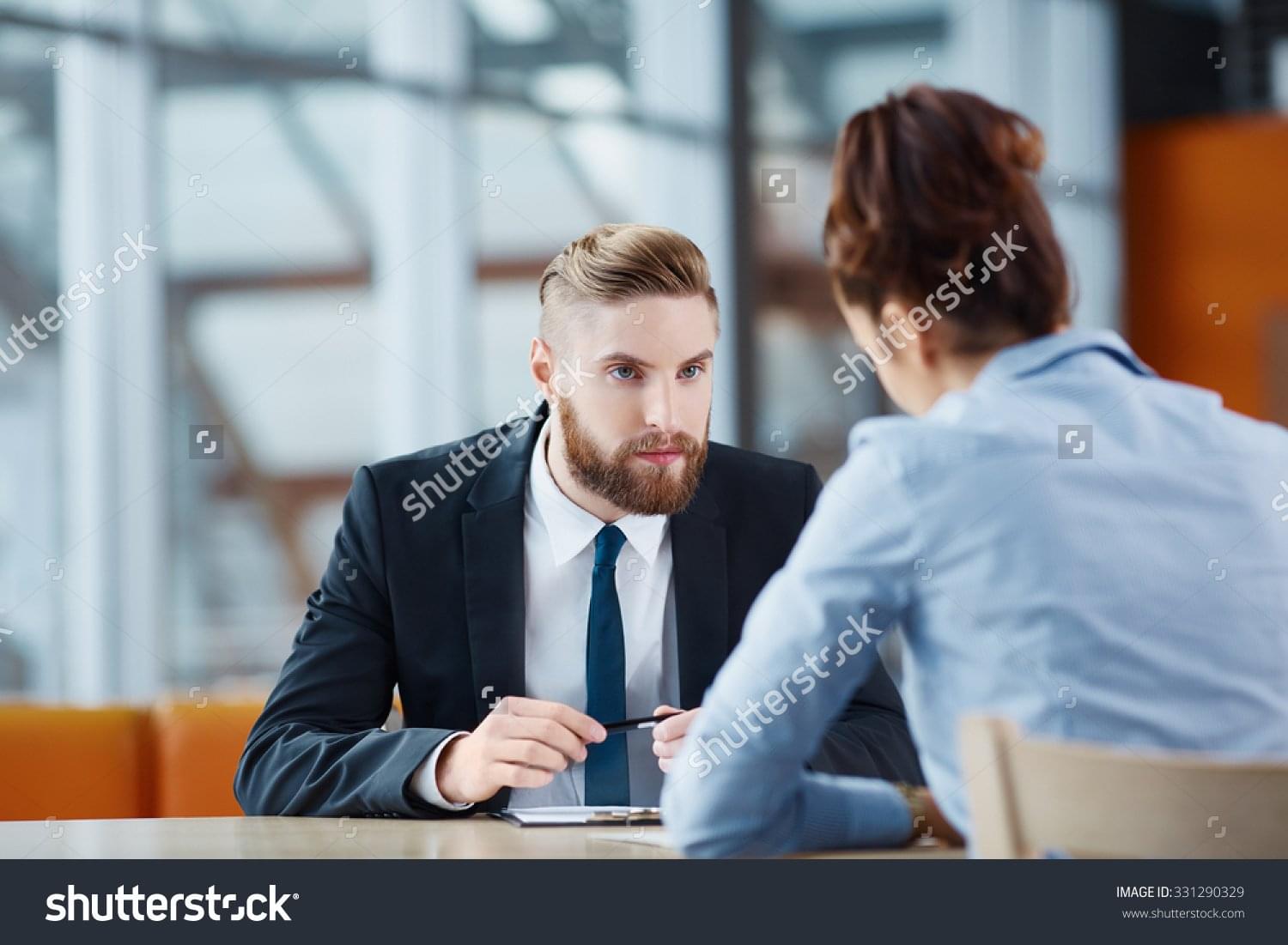 stock-photo-recruiter-asking-questions-during-job-interview-331290329